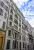 15-17 Canebière, façade en pierre sur rue avec balcons en ferronnerie et volets